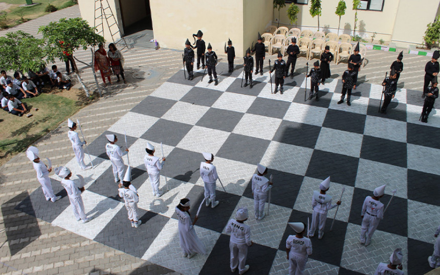 Chess Played by Human Pieces